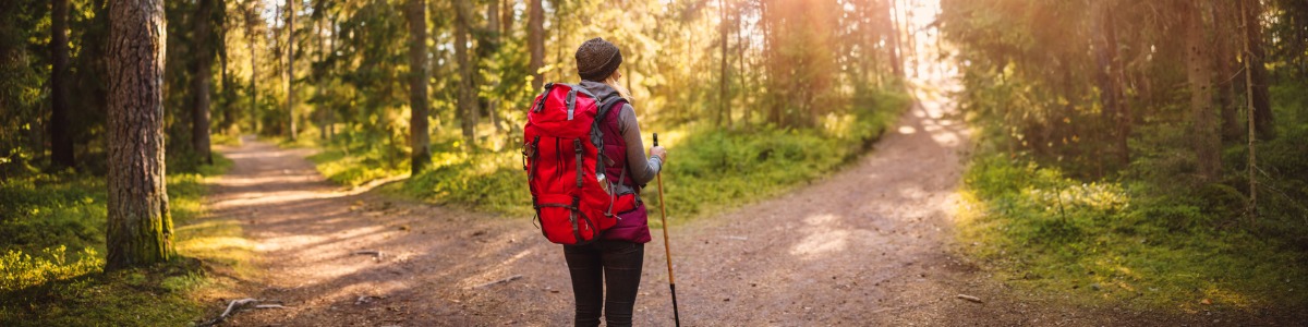 woman hiking choice of paths